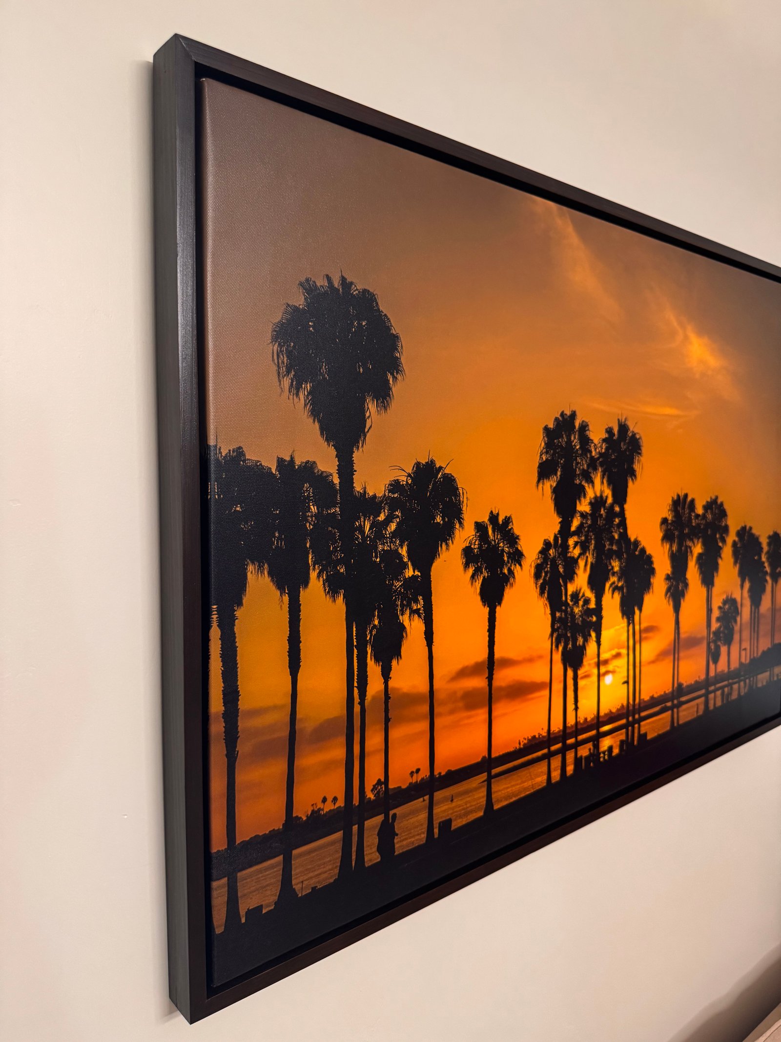 Floating canvas frame — black finish, side view